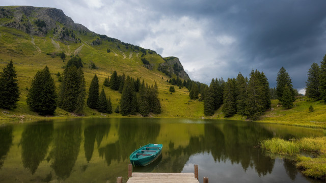 Boat dock lake mountains cloudy free wallpaper for desktop - medium preview image