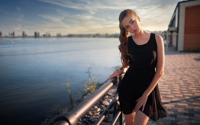 Woman railing sunset city beach free wallpaper for desktop - medium preview image