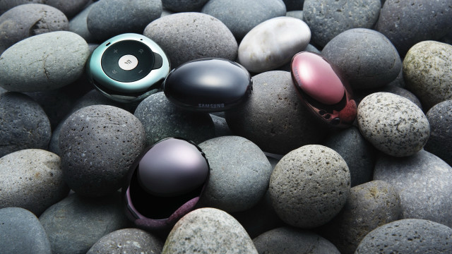 Pile rocks headphones earbuds top free wallpaper for desktop - medium preview image