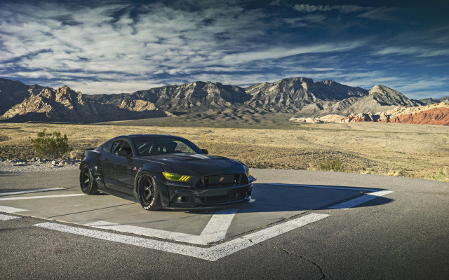 Black sports car mountains clouds free wallpaper for desktop - medium preview image
