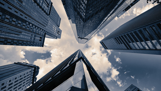 Cityscape tall buildings cloudy day free wallpaper for desktop - medium preview image