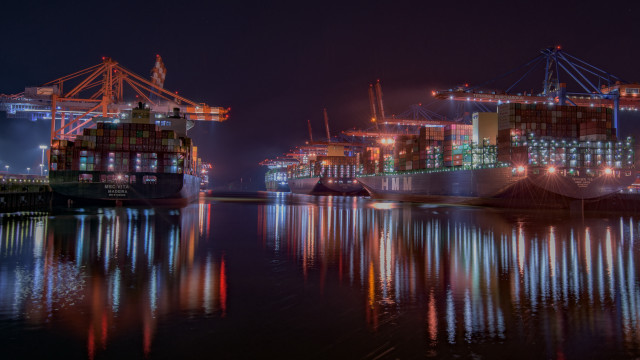 Large ship dock night cityscape free wallpaper for desktop - medium preview image