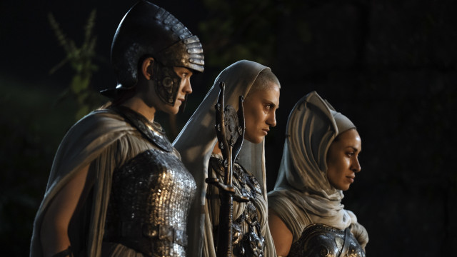 Three costumed people dark room free wallpaper for desktop - medium preview image