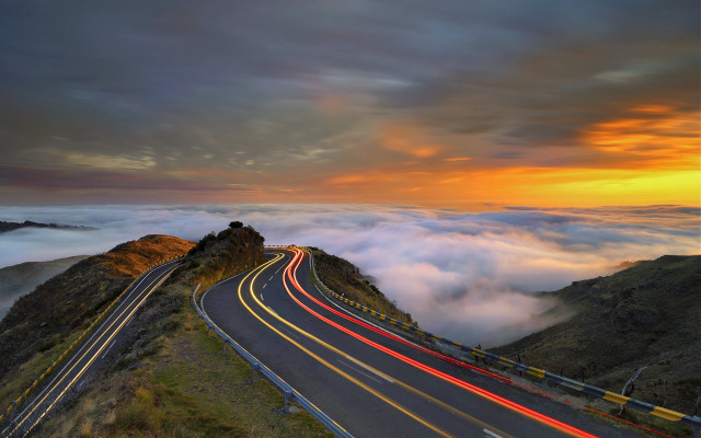 Mountain road cars sunset horizon free wallpaper for desktop - medium preview image