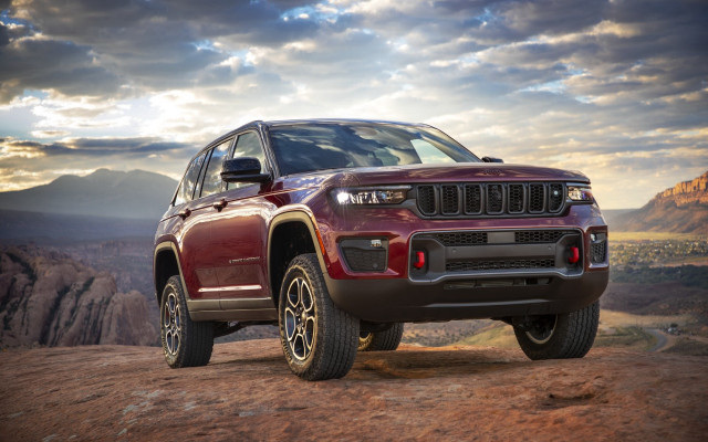 Red jeep mountains cloudy sunset free wallpaper for desktop - medium preview image