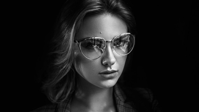 Woman glasses jacket blackandwhite portrait free wallpaper for desktop - medium preview image