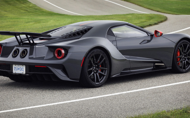 Grey sports car winding road free wallpaper for desktop - medium preview image