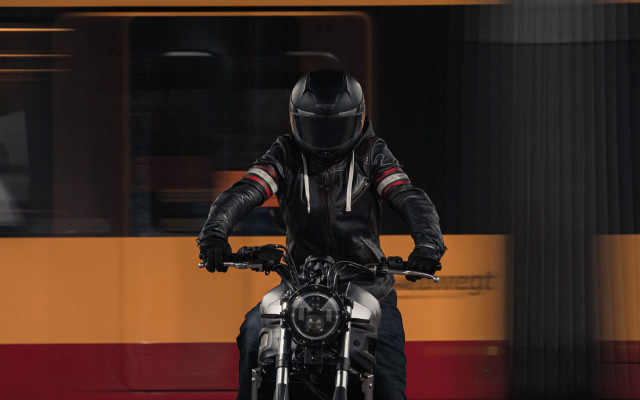 Man motorcycle train city panfuturism free wallpaper for desktop - medium preview image