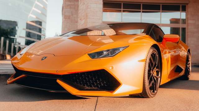 Yellow sports car building large #2 free wallpaper for desktop - medium preview image