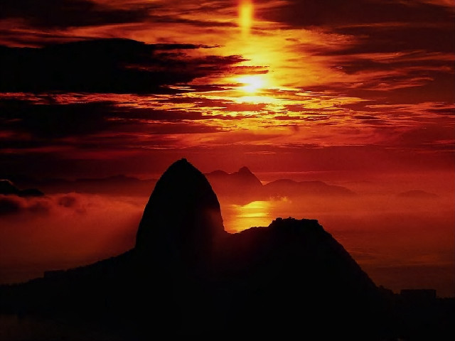 Sunset large rock orange sky free wallpaper for desktop - medium preview image