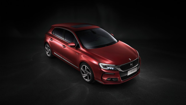 Red car dark room hyperrealism free wallpaper for desktop - medium preview image