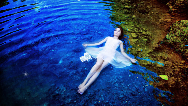 Woman floating water bag surreal free wallpaper for desktop - medium preview image