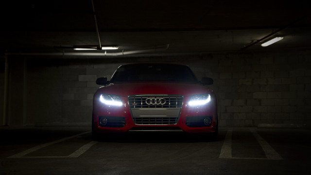 Red car dark parking headlights free wallpaper for desktop - medium preview image