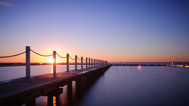 Sunset dock water bridge city free wallpaper for desktop - medium preview image