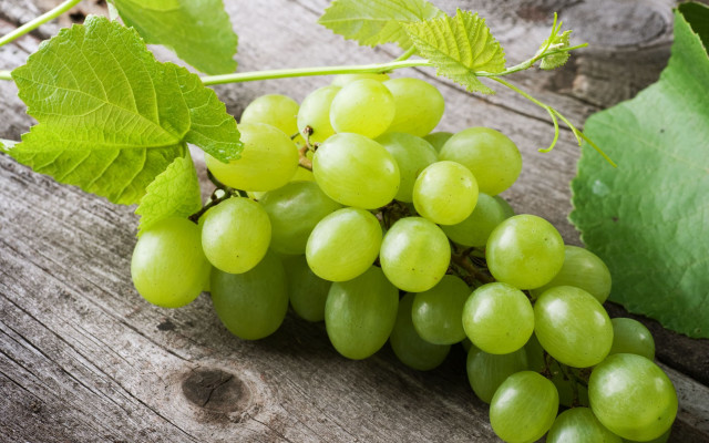 Grapes wooden table leafy plant free wallpaper for desktop - medium preview image