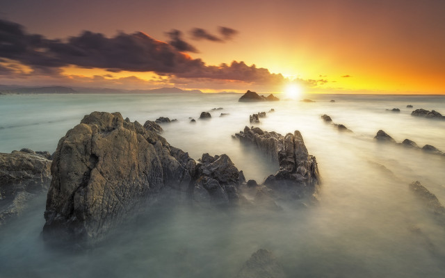 Sunset rocky beach clouds ocean #4 free wallpaper for desktop - medium preview image