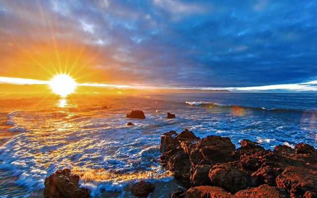 Sunset ocean rocks waves person free wallpaper for desktop - medium preview image