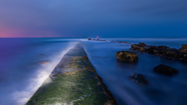 Lighthouse beach water rocks night free wallpaper for desktop - medium preview image