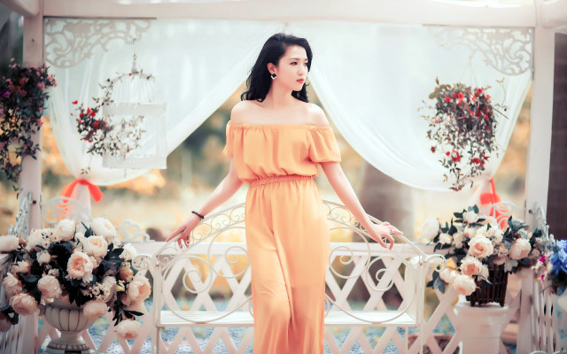 Woman yellow dress balcony flowers free wallpaper for desktop - medium preview image