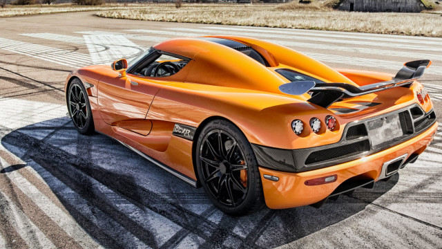 Orange sports car track sky free wallpaper for desktop - medium preview image