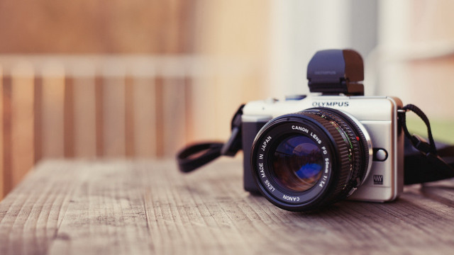 Camera wooden table macro photorealism free wallpaper for desktop - medium preview image