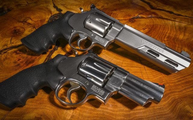 Revolvers wooden table silver grips free wallpaper for desktop - medium preview image