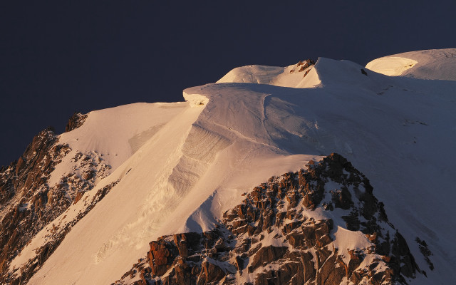 Snowy mountain peak rocks desert free wallpaper for desktop - medium preview image