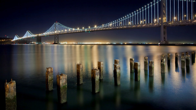 Bridge water night lights poles free wallpaper for desktop - medium preview image