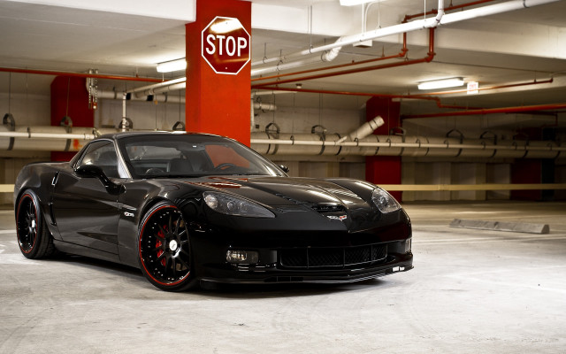 Black sports car stop sign free wallpaper for desktop - medium preview image