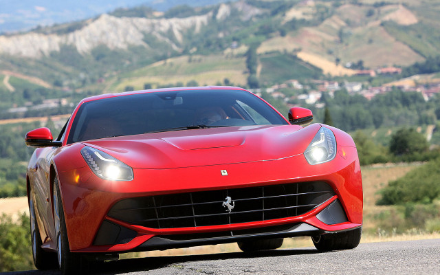 Red ferrari mountains town sunny free wallpaper for desktop - medium preview image