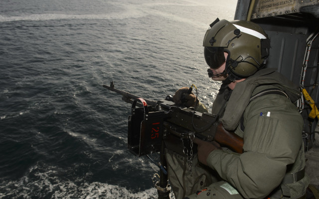 Military man boat water gun free wallpaper for desktop - medium preview image