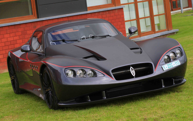 Black sports car red brick free wallpaper for desktop - medium preview image