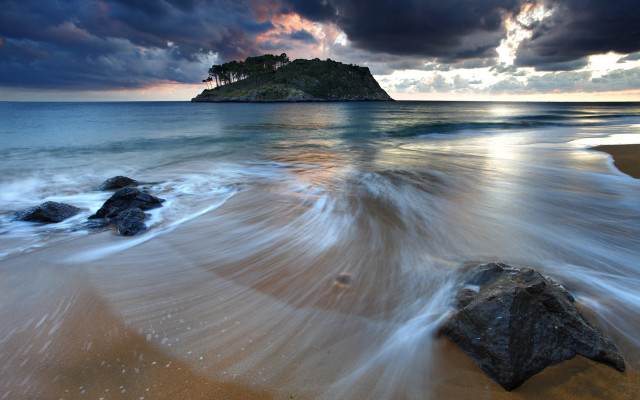 Beach rock island cloudy sky free wallpaper for desktop - medium preview image