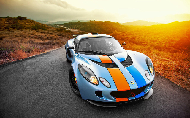 Blue orange sports car sunset free wallpaper for desktop - medium preview image