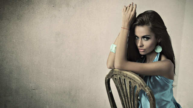 Woman blue dress leaning chair #2 free wallpaper for desktop - medium preview image