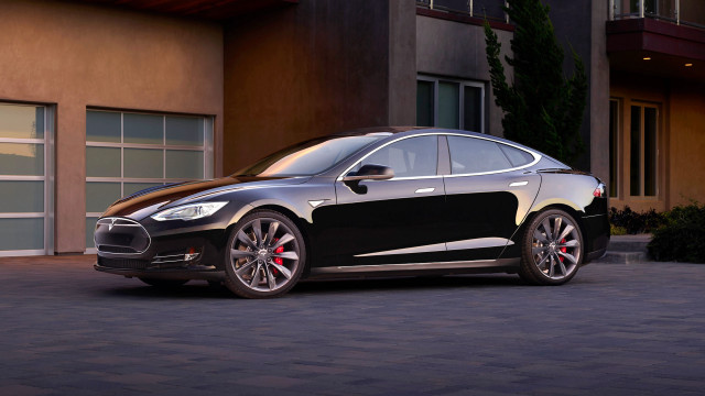 Black tesla building garage parked free wallpaper for desktop - medium preview image