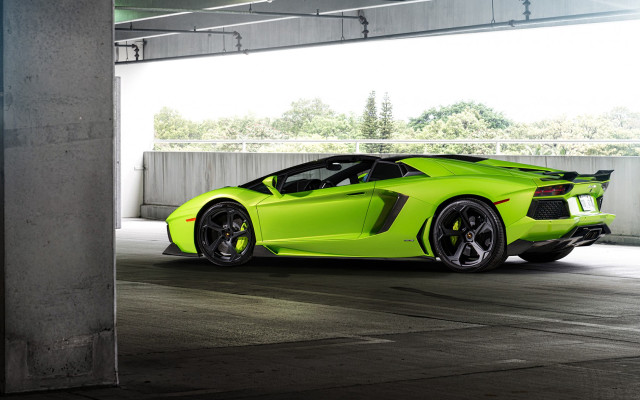 Lime green sports car parking free wallpaper for desktop - medium preview image