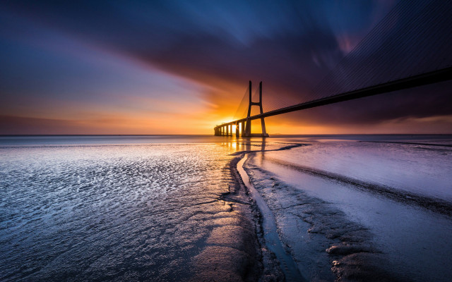 Sunset bridge water ice city free wallpaper for desktop - medium preview image