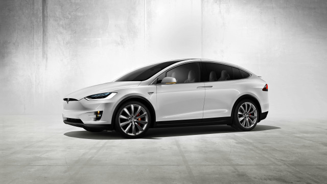 White tesla electric car concrete #3 free wallpaper for desktop - medium preview image