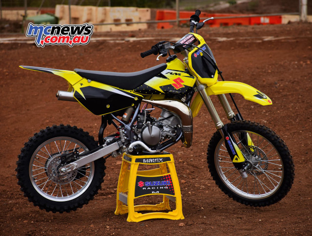 Yellow dirt bike stand dirt free wallpaper for desktop - medium preview image
