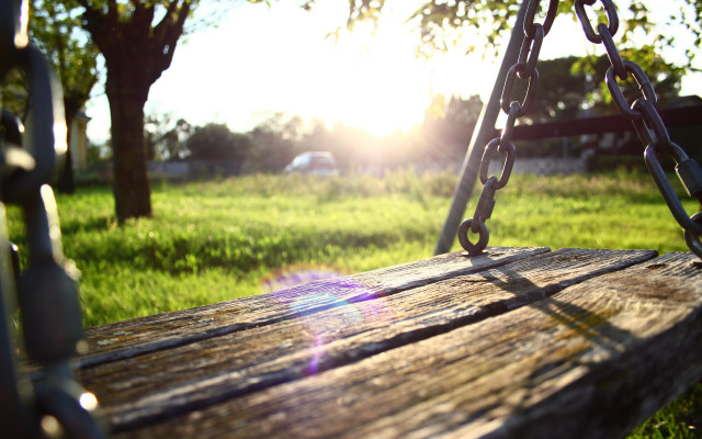 Wooden swing park sunshine blurry free wallpaper for desktop - medium preview image