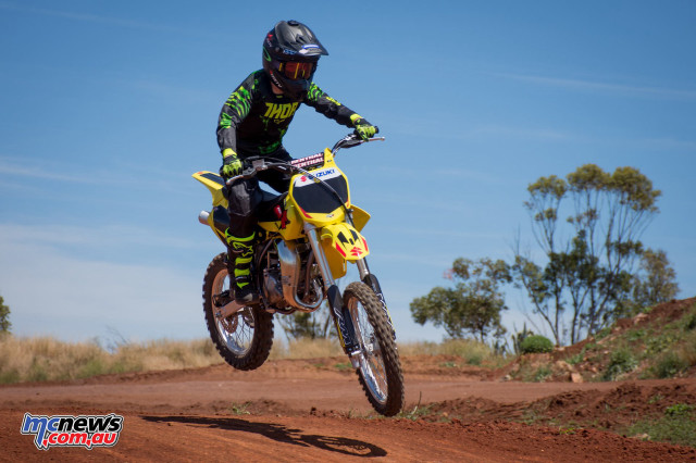 Man riding dirt bike field free wallpaper for desktop - medium preview image