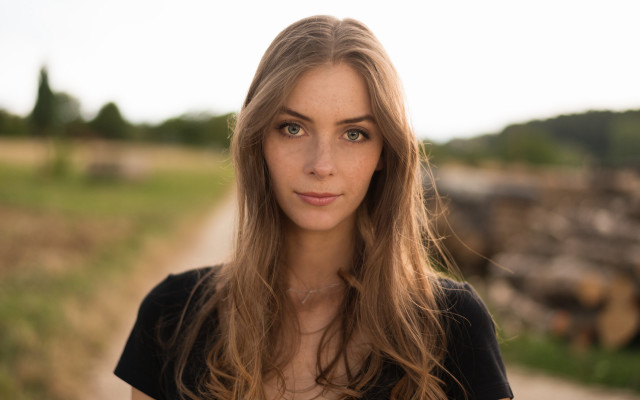 Woman longhair field dirtroad bokeh free wallpaper for desktop - medium preview image