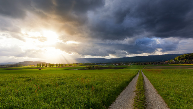 Dirt road field sunbeam clouds free wallpaper for desktop - medium preview image