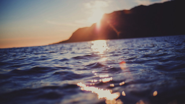 Sunshine ocean mountains blue sky free wallpaper for desktop - medium preview image