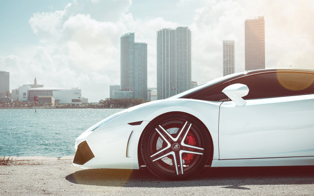 White sports car city lake free wallpaper for desktop - medium preview image