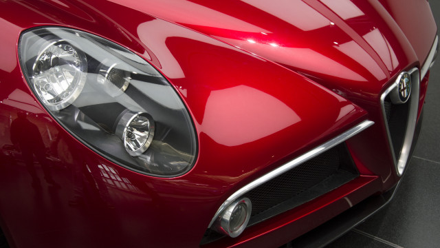 Red sports car headlight photorealism free wallpaper for desktop - medium preview image