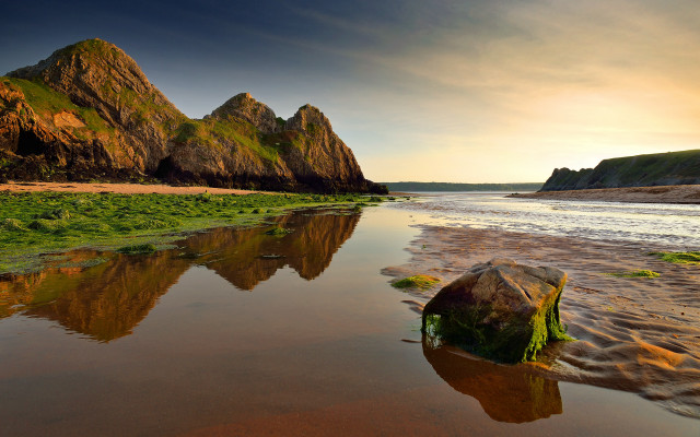 Beach rock water mountain sky free wallpaper for desktop - medium preview image