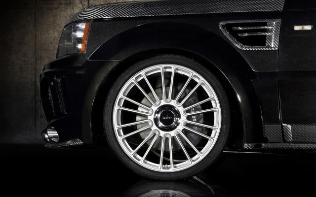 Black car chrome rim reflection free wallpaper for desktop - medium preview image