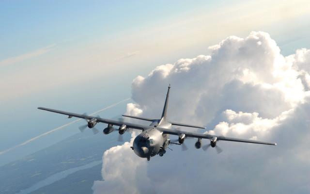 Large jetliner cloudy sky city free wallpaper for desktop - medium preview image